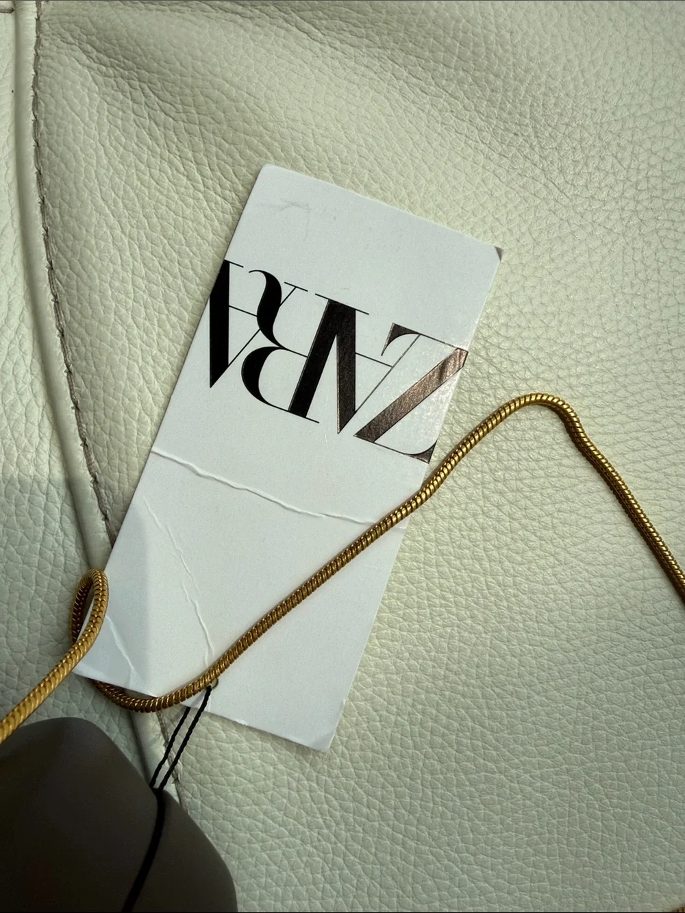 Zara Oval Dark BrownClutch with Metallic Accents